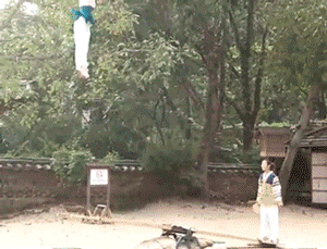 gifs - two people jumping on a seesaw
