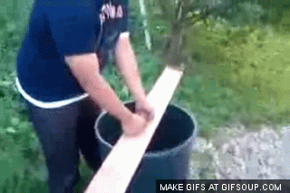 gifs - man breaks a plank of wood