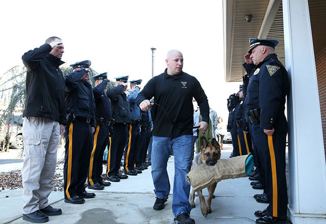 Officers salute retired, terminally ill K9 as he heads to the vet to be euthanized