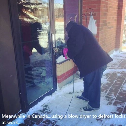 snow - Meanwhile in Canada...using a blow dryer to defrost locks at work...