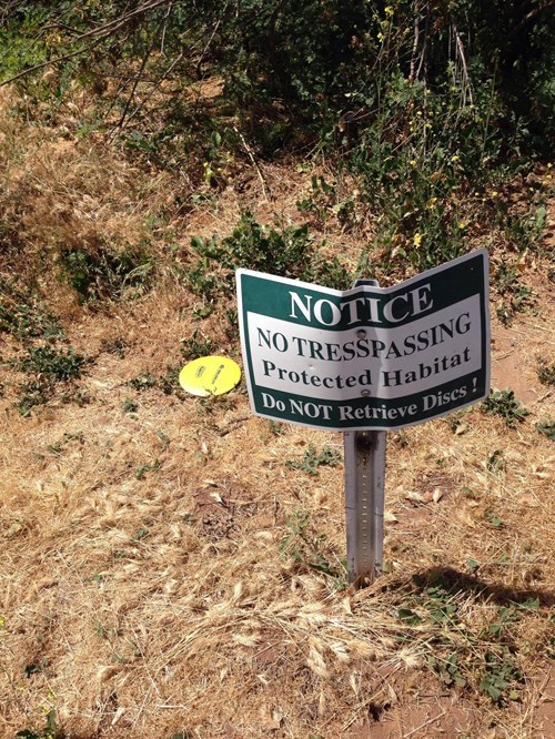 Shit happens - Notice No Tresspassin Do Not Retrieve Habitat lieve Discs!