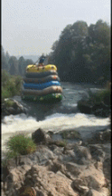 stack of boats on white water rafting