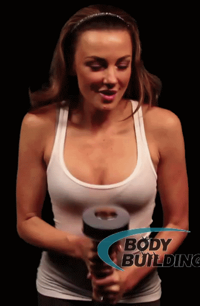 girl holding vibrating body building device
