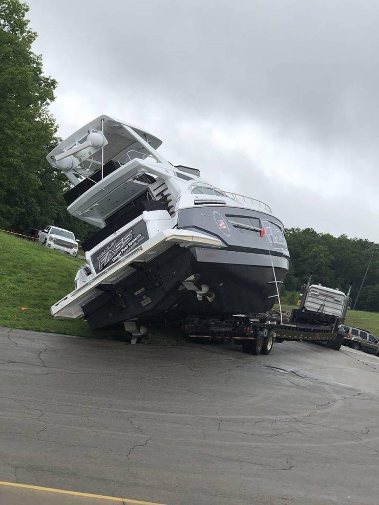 boat on trailer tipped over on highway