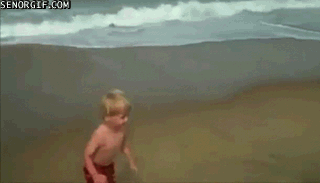 kid falling on beach gif - Senorgif.Com