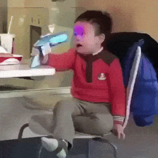 asian kid with laser gun