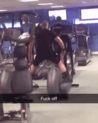 guy riding two ellipticals - Fuck off