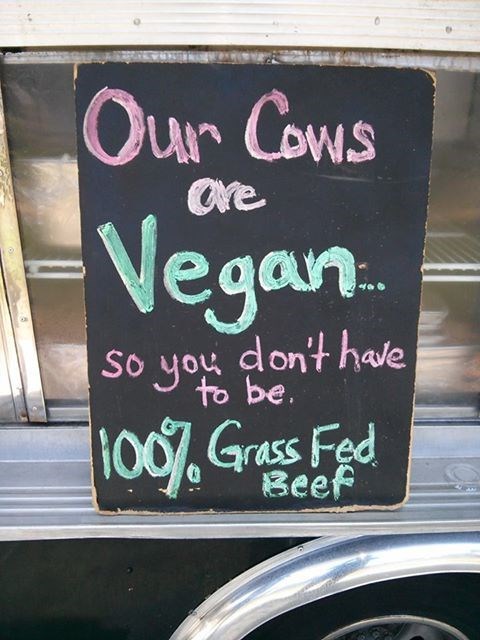 signage - Our Cows Vegan no ave So 100%. you don't have to be. Grass Fed Beef