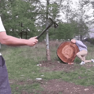 ax throwing gif funny