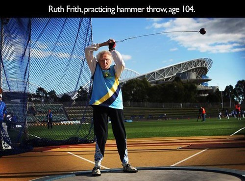 old people living life to the fullest - Ruth Frith, practicing hammer throw, age 104.