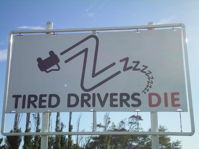 street sign - 2222 Lis Tired Drivers Die