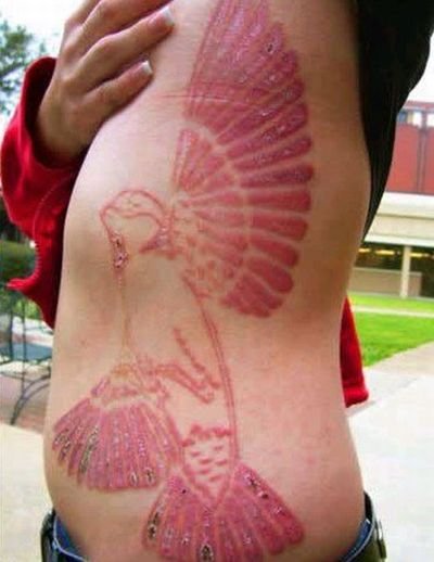 Insane Scarification Tattoos
