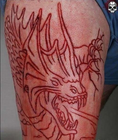 Insane Scarification Tattoos
