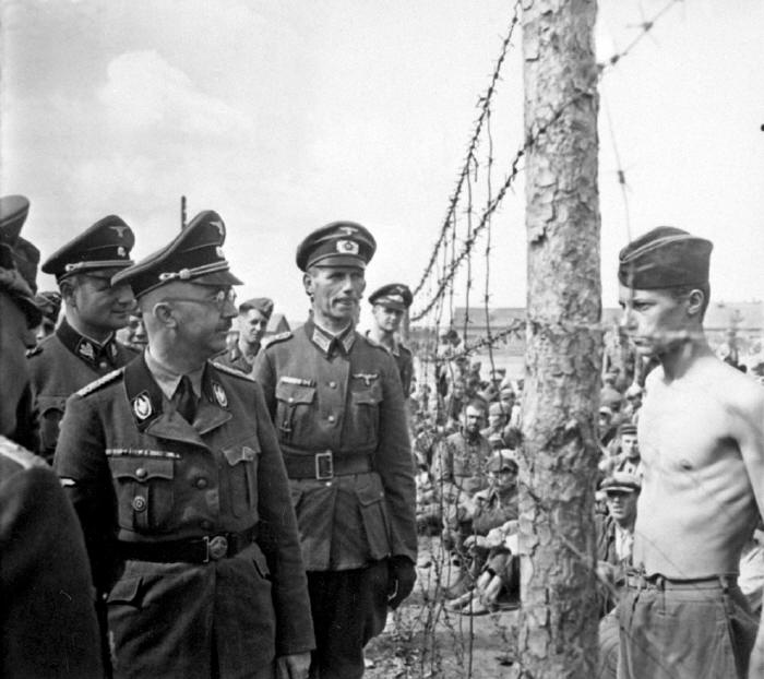 PoW Horace Greasley defiantly confronts Heinrich Himmler during an inspection of the camp he was confined in. Greasley also famously escaped from the camp and snuck back in more than 200 times to meet in secret with a local German girl he had fallen in love with.