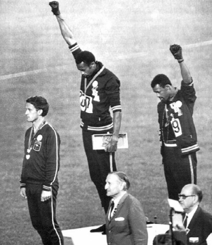 Tommie Smith and John Carlos raise their fists in a gesture of solidarity at the 1968 Olympic games. Both Americans were expelled from the games as a result.