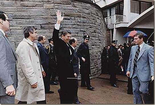 President Reagan less than a second before the madman Hinckley opened fire.
