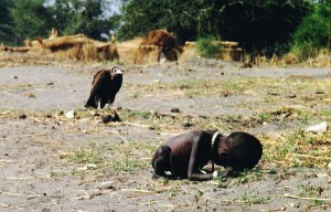 The vulture is waiting for the girl to die to eat her. The photograph was taken by South African photojournalist, Kevin Carter, while on assignment to Sudan. He took his own life a couple of month later due to depression.