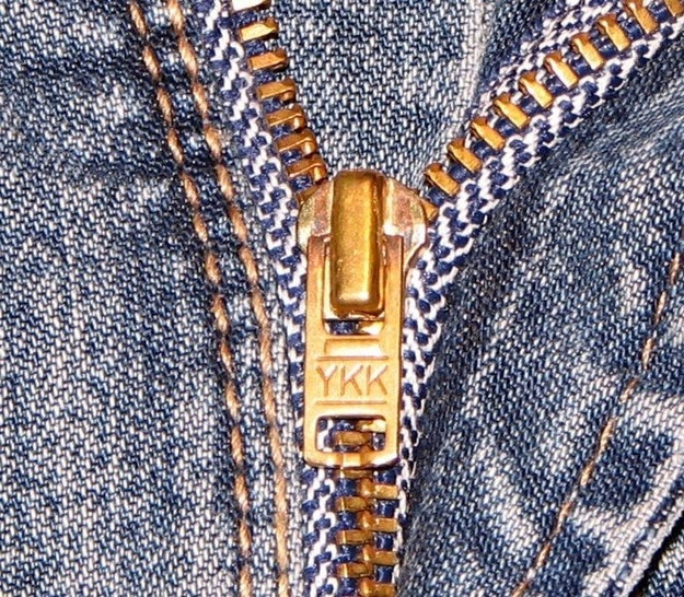 The "YKK" on your zipper stands for "Yoshida Kogyo Kabushikigaisha:"
