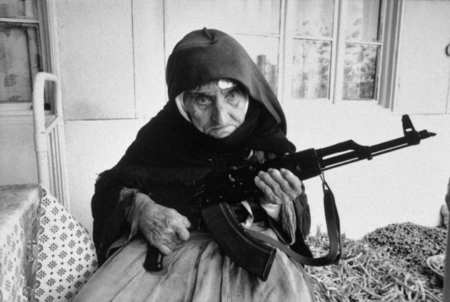 106-year old Armenian woman protecting her home with an AK-47. 1990.