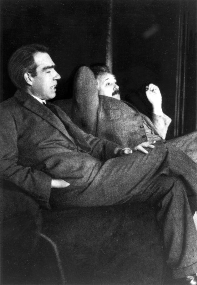 Niels Bohr and Albert Einstein at the Bohr-Einstein debates over quantum mechanics.