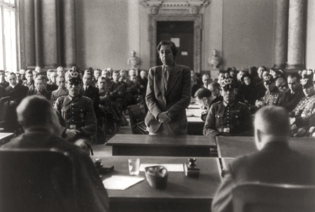 Elisabeth "Lilo" Gloeden stands before judges, on trial for being involved in the attempt on Adolf Hitler's life, 1944.