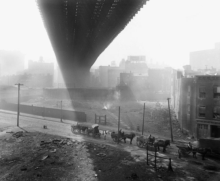 Shadows are cast beneath the Brooklyn Bridge, seen from a stable roof, on May 6, 1918.