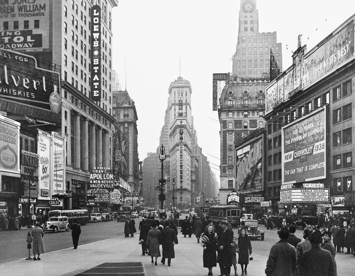 Times Square theaters by day, in New York City. The Times Building, Loew's Theatre, Hotel Astor, Gaiety Theatre and other landmarks are featured in this January, 1938 photo.