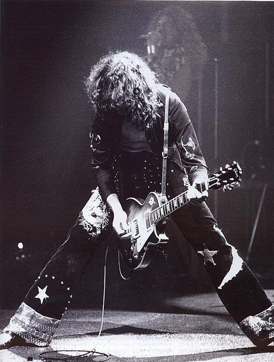 Jimmy Page performing live with Led Zeppelin. Circa 1972.