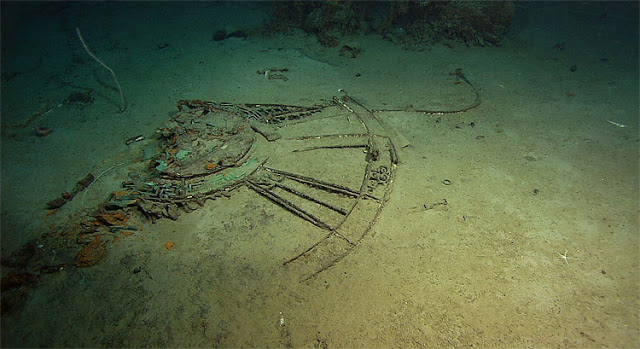 The skylight frame, from either the grand staircase or the aft staircase, rests on the sea floor near the stern debris field of the Titanic on June 6, 2004. Institute for ExplorationUniversity of Rhode Island