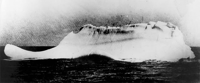 An iceberg, presumed to be the one that was struck by the RMS Titanic, is pictured from the deck of the cable ship Mackay-Bennett on April 15, 1912. The New York Times