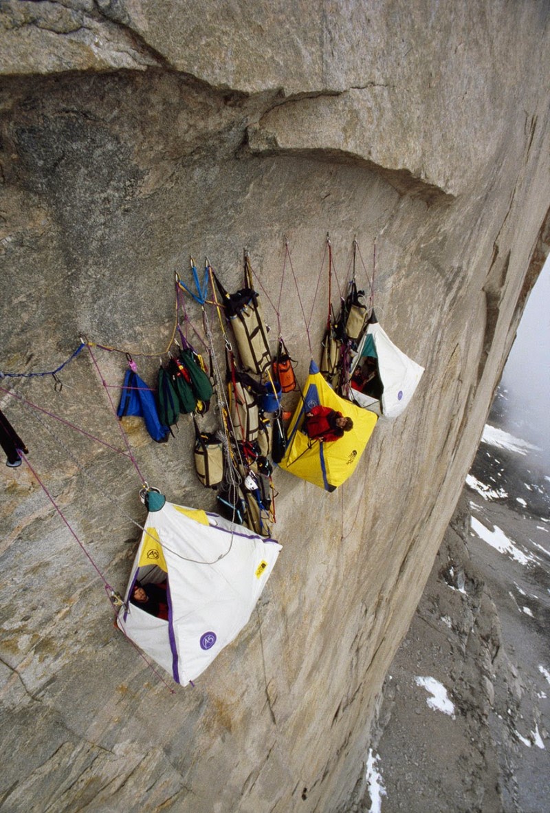4. Campers on an Arctic Cliff A group of climbers camp out in tents hanging off a 4,000-foot cliff face in the Arctic.
