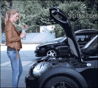 Woman adding quart of oil to car