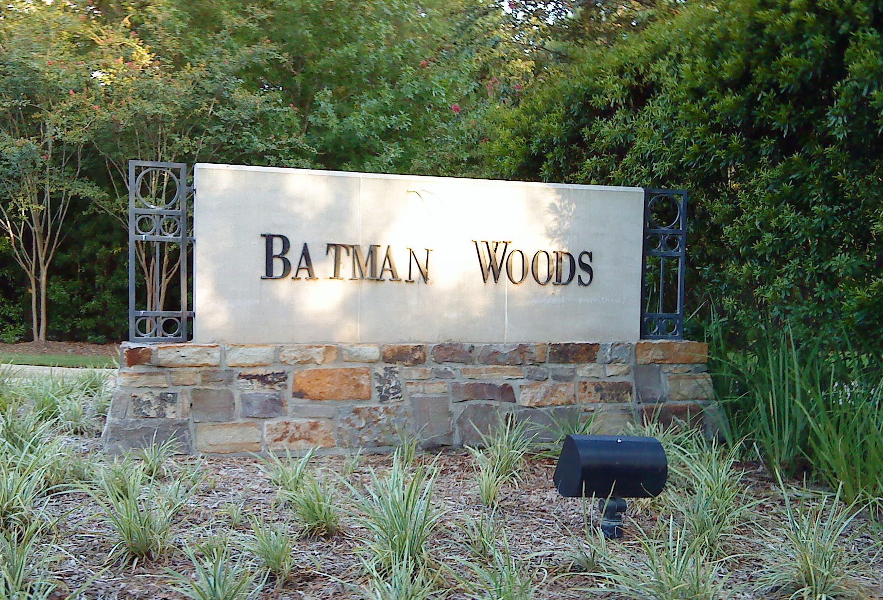 This is the sign in for my neighborhood. Its supposed to say Bantam Woods, but somebody changed it to Batman Woods.