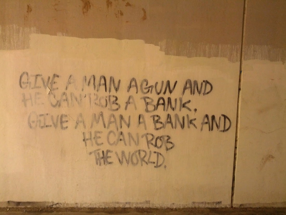 deep graffiti quotes - Give A Man Agun And Hegan Rob A Bank, Give Aman A Bank And He Can Rob "The World,