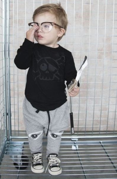 Chucky like picture in a cage of course showing the One eye. Pizza anyone?