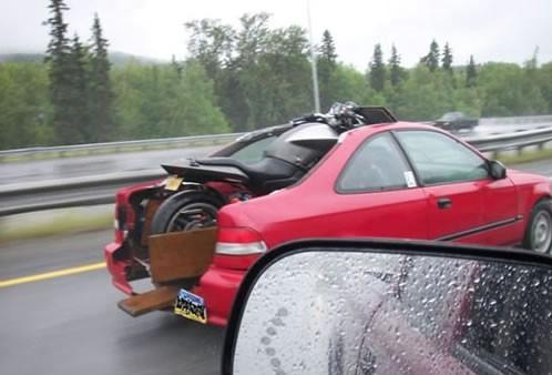 This Guy Tore Apart His Car Just To Fit His Motorcycle Inside