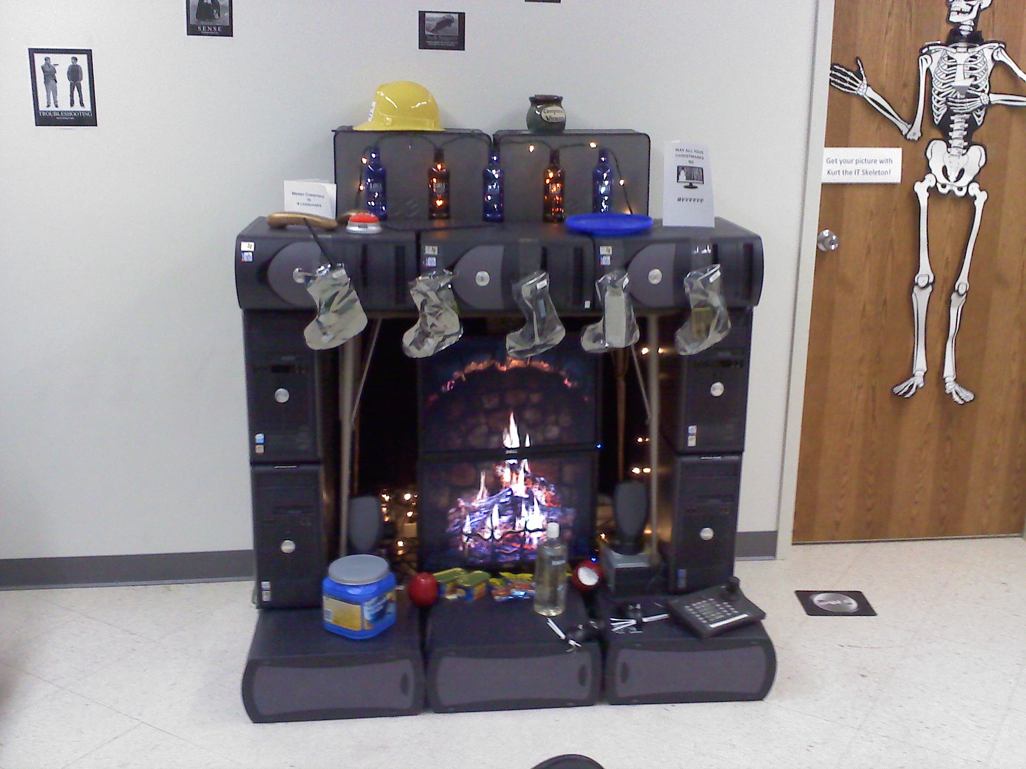 Our IT Departments Fireplace made from old Dell computers. The stockings are electrostatic bags. And of course you have to like the Bawls Bottles. 