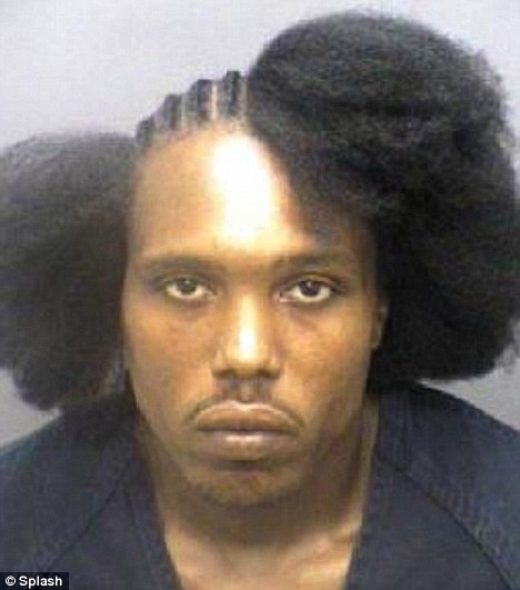 Tyrone was apprehended while getting "corn rows" fashioned into his head...