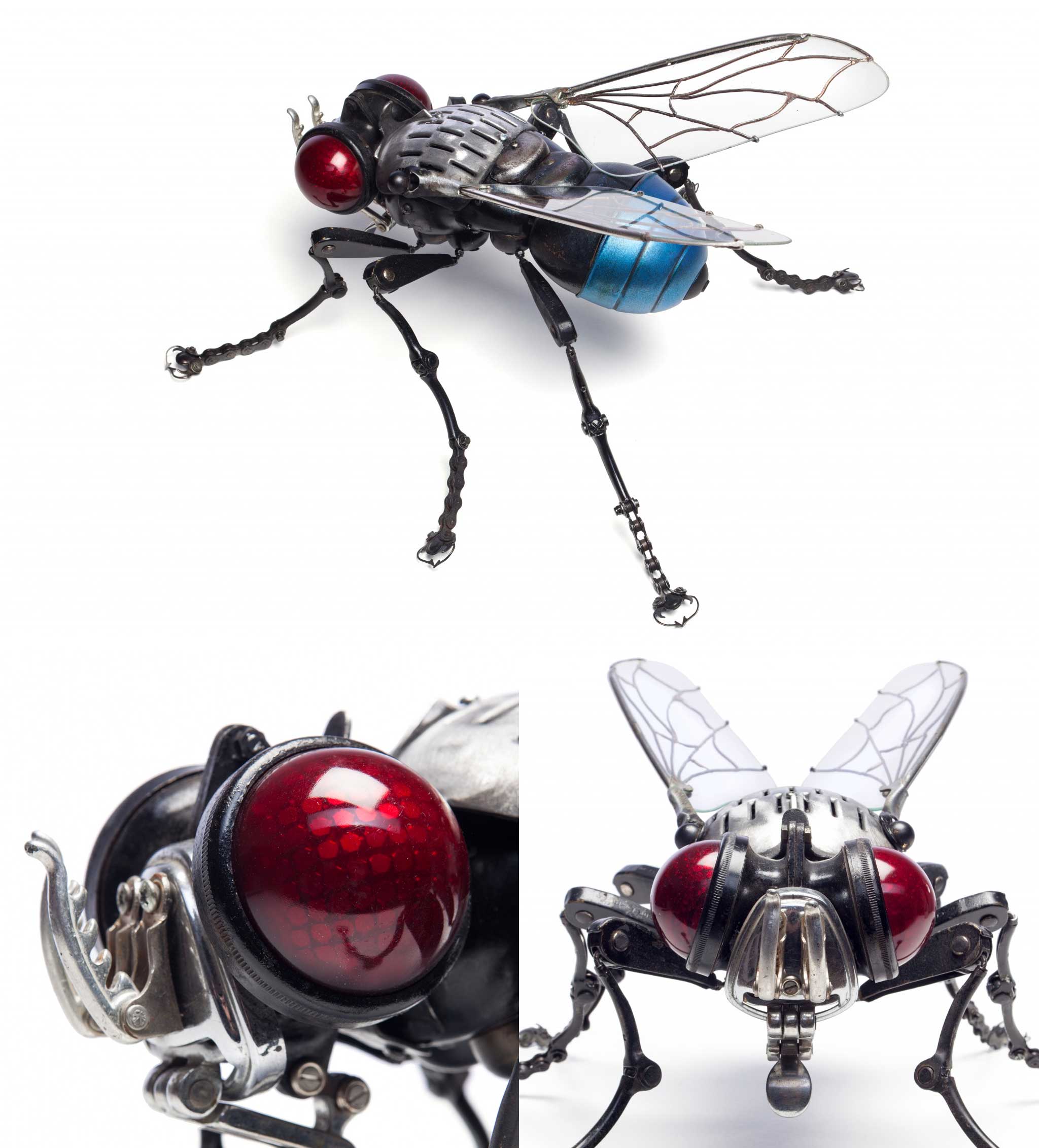 "Fly" 2016, Edouard Martinent. Legs: wiper arm, bicycle brakes, bicycle chains, typewriter parts. Head: motor vehicle rear lights. Trunk: car trunk hinge. Antennas: ski boot clasps. Thorax: motorcycle headlight, 50s kitchen utensil. Wings: glass, wiper, solder lead. Abdomen: motorcycle headlight, ceiling light part.