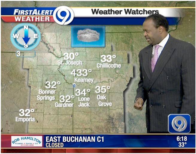 Local weatherman Brian Busby looking at the weather map showing it to be 433 in Kearney. It's hotter than hell there!