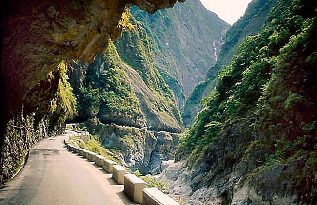 A tunnel with no lights off a cliff equals a disaster waiting to happen. Tourist love it because it passes right through a national park. At least there's a cement guard rail system.  Read Full Article At: http://www.mediadump.com/hosted-id108-the-most-dangerous-roads-in-the-world