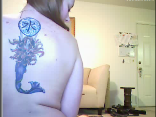 wicked tattoo on girl's back