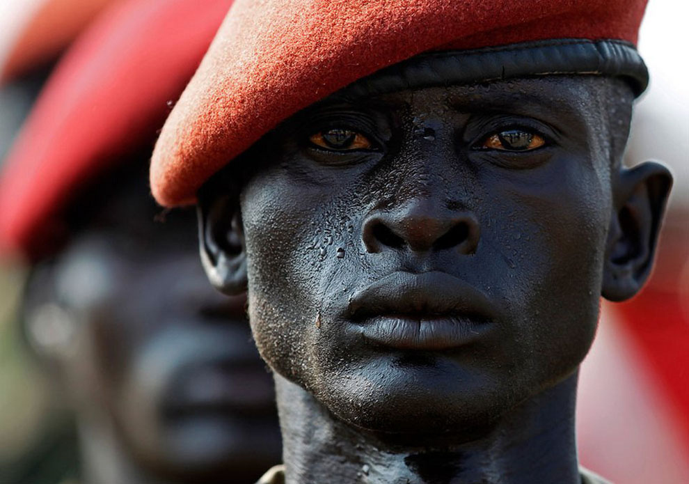 A Sudan People’s Liberation Army soldier stands at attention on the eve of South Sudan’s independence from Sudan.