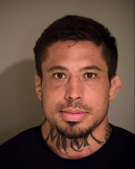 MMA fighter Jonathan Koppenhaver, who fights under the alias War Machine, is arrested in Simi Valley, Calif., on Aug. 15 after an alleged brutal assault on ex-girlfriend Christy Mack.