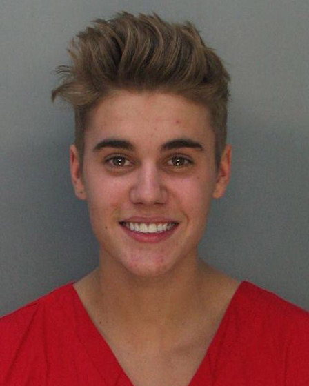 Justin Bieber beams in his booking photo in Miami, Fla., on Jan. 23. The boy wonder was arrested for alleged drunken driving, as well as resisting arrest and driving without a valid license.