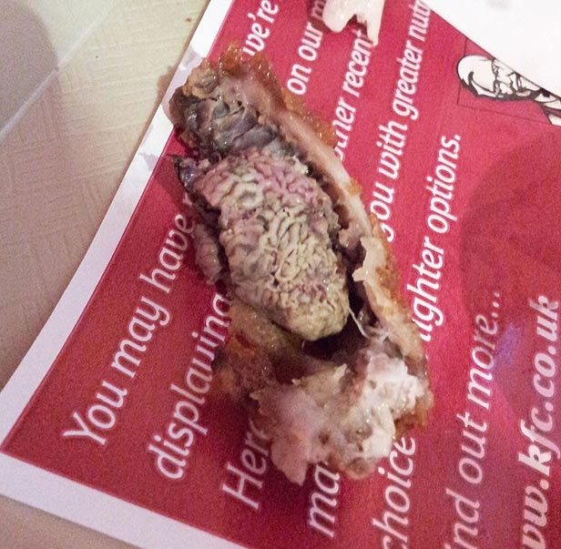 KFC apologized to a 25-year-old U.K. student who found what looked like a chicken brain in his meal. He was quoted saying “I have a habit of picking the chicken off the bone with my fingers and as I pulled the second piece apart, I saw this horrible wrinkled foreign body,". Yummy..