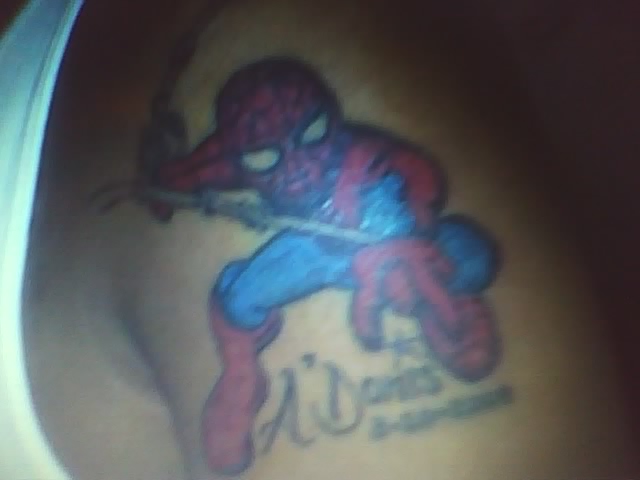 Spider Man tattoo on a black guy. Too see more tattoo pictures like this go to my website:    http://e7292fd0.megaline.co