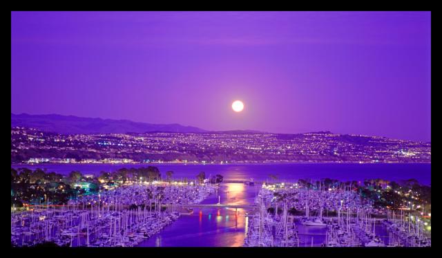 The moon is in this position over Dana Point Harbor for two hours one time each year in early to mid April. I love the color of the sky in this. Taken by a professional photographer in California. His site is www.checkoutmyimages.com.