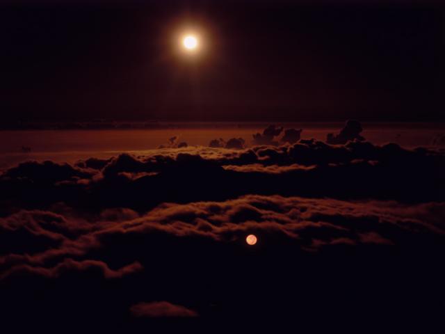 Taken at sunset over the Haleakala volcano crater. I think it is on Maui but I do not remember for sure. Taken by the same California photographer as the Dana Point Harbor photo. You can see his work at www.checkoutmyimages.com