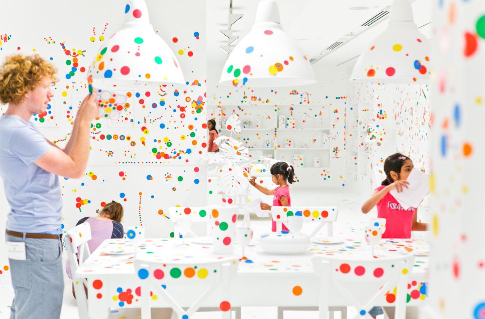 Artist let kids put stickers all over a white room